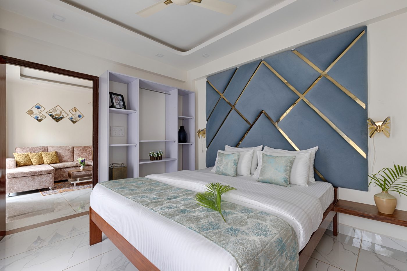 Premium bedroom with blue gold headboard